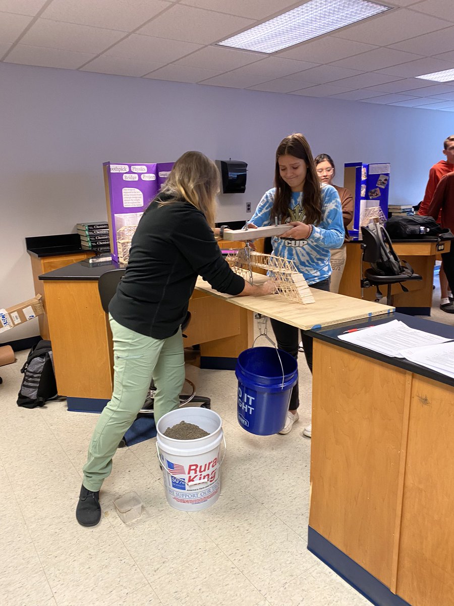 Physics students at our Martinsville site tested out their bridge designs today to see how much weight each one could hold.