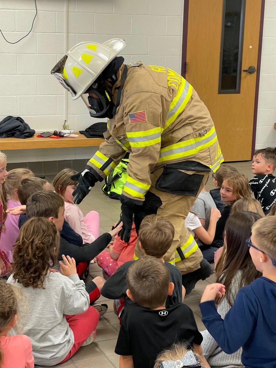 Kindergartners learning all about our local fire fighters.