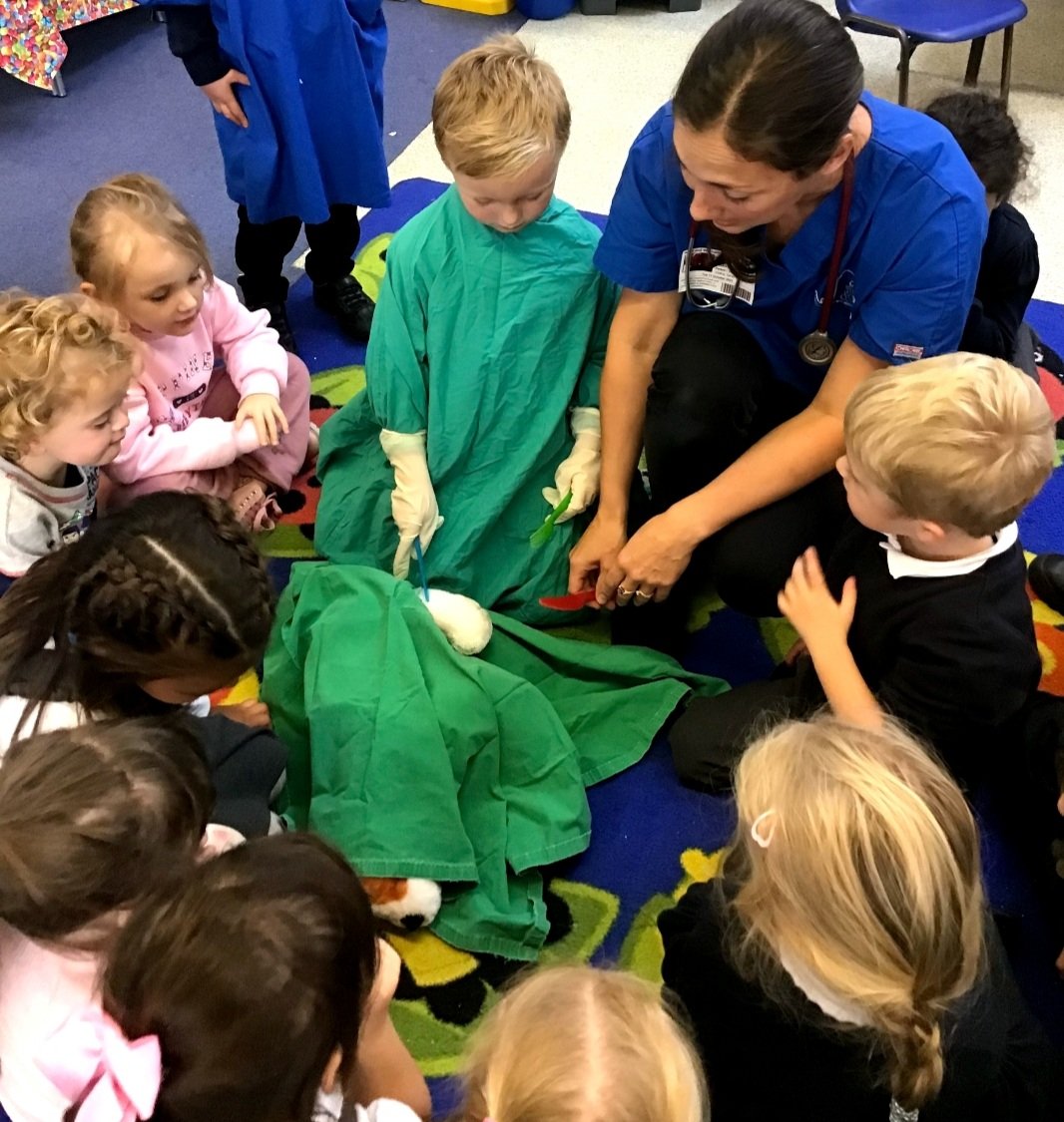 MepalWitchamCoE's tweet photo. EYFS were visited from one of our parents who is a vet! The children learned about vets, helped an injured pet, x-ray, perform surgery &amp; bandage a poorly leg! Then heard a real dogs heart beating through a stethoscope! WOW!🐕 school &amp;community @DEMAT @CEO_DEMAT @ClaireGray2019 https://t.co/vz04d9wSvw