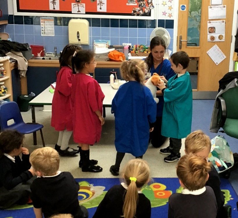 MepalWitchamCoE's tweet photo. EYFS were visited from one of our parents who is a vet! The children learned about vets, helped an injured pet, x-ray, perform surgery &amp; bandage a poorly leg! Then heard a real dogs heart beating through a stethoscope! WOW!🐕 school &amp;community @DEMAT @CEO_DEMAT @ClaireGray2019 https://t.co/vz04d9wSvw