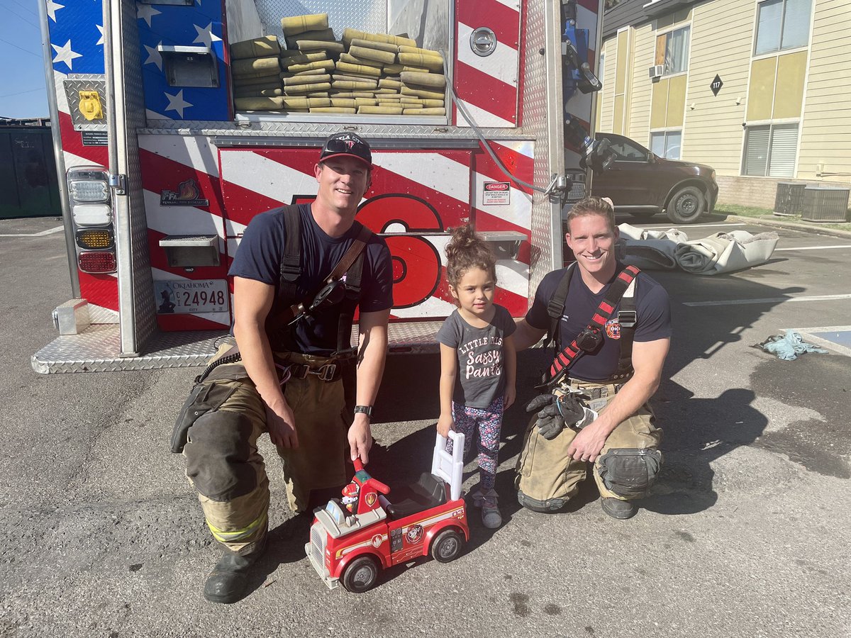 OKCFD's tweet photo. It’s always nice to respond to an emergency call and find a little one whose favorite toy is a fire truck. ￼￼ The firefighters gave her a badge sticker, so now she is official 🙂!￼ #AwesomeKiddo https://t.co/QeELi7EWD7