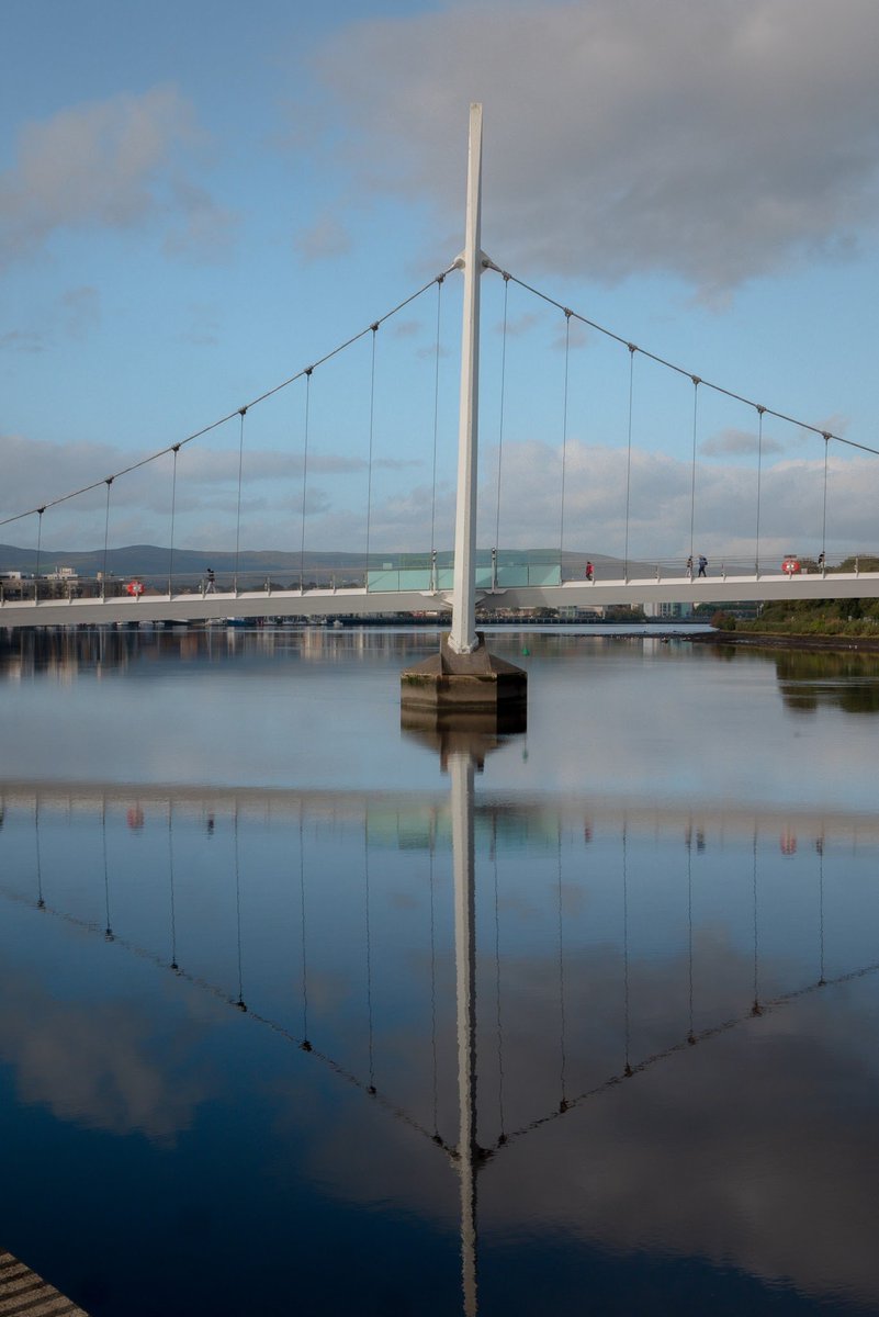 Reflections on the Foyle, a different angle on this beautiful bridge in Derry city <a href="/Derryvisitor/">Visit Derry</a> <a href="/LCorken/">Lynn Corken</a> <a href="/Londonderry/">Londonderry</a> <a href="/CityToursDerry/">Mc Crossan City Tours</a> <a href="/DiscoverNI/">Northern Ireland</a> <a href="/bbcniweather/">BBC NI Weather</a> <a href="/BBCRadioFoyle/">BBC Radio Foyle</a> <a href="/foylemaritime/">Foyle Maritime Festival</a> <a href="/Foylerescue/">Foyle Search& Rescue</a>