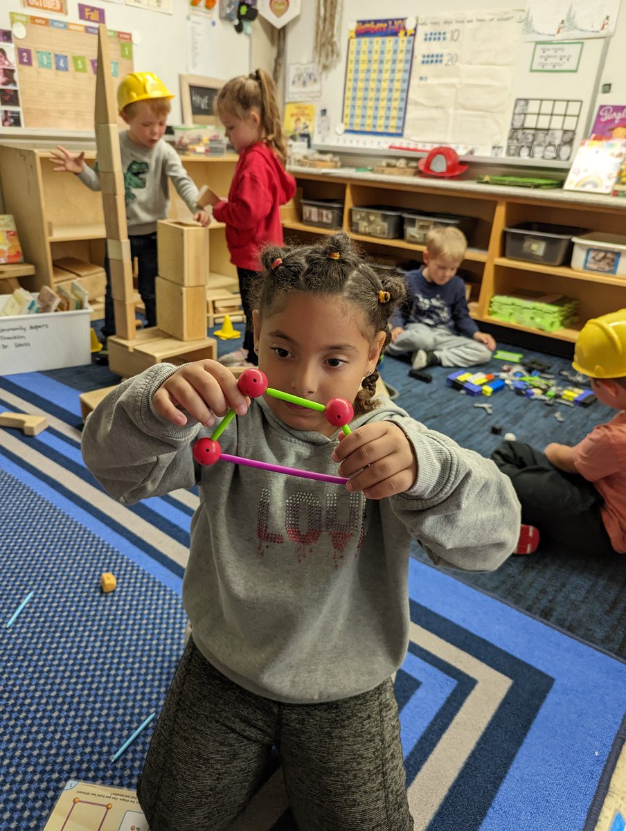 We used a variety of materials to build shapes today.  Wasan was very proud to share that she built a trapezoid!  #learningthroughplay #reallifemath #builders