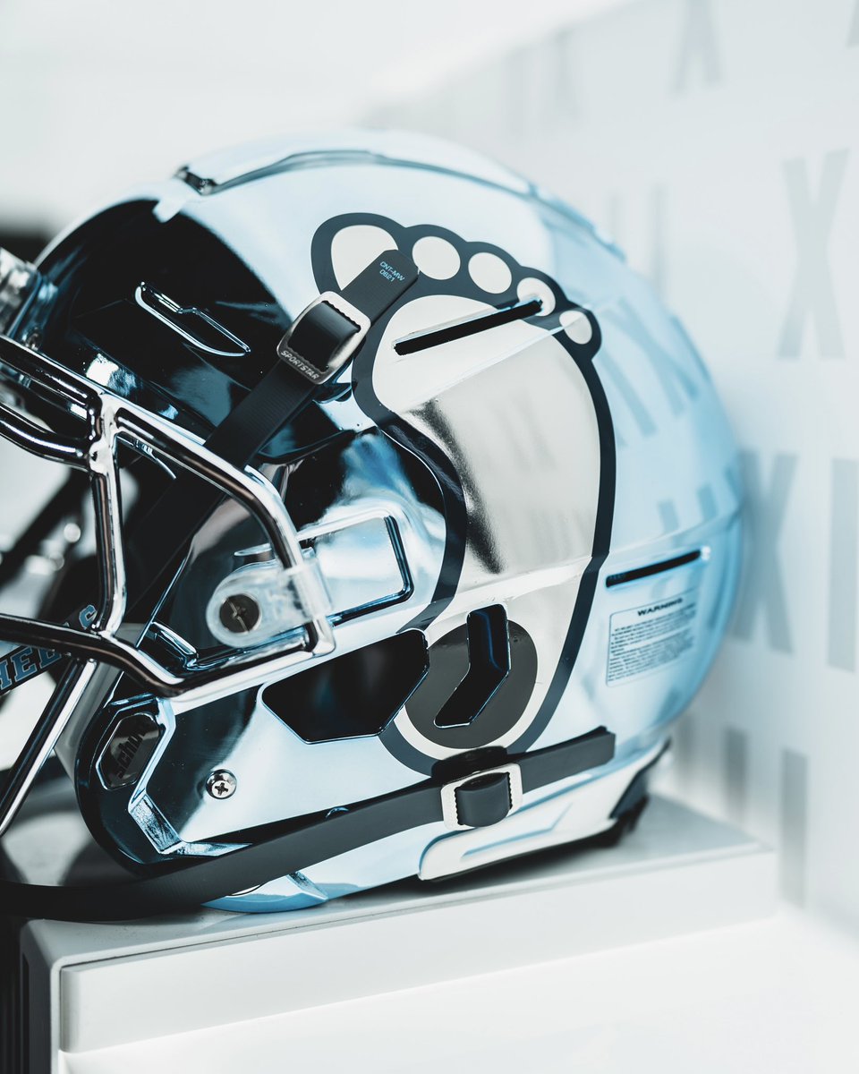 GolfNBS's tweet photo. North Carolina’s chrome helmets for this weekend are sick 🥶 https://t.co/ivSirBn2Fu