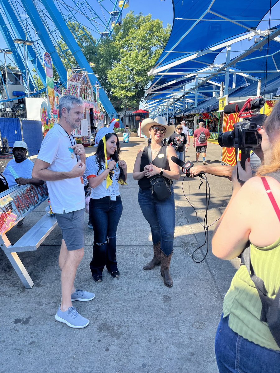 BigTexNews's tweet photo. Let the games begin! Fellow co-hosts @HawkeyeOnAir and @michrod from @963kscs battled it out in the @StateFairOfTX Midway Olympics today!🥇@Audacy https://t.co/vEv1exdXJL