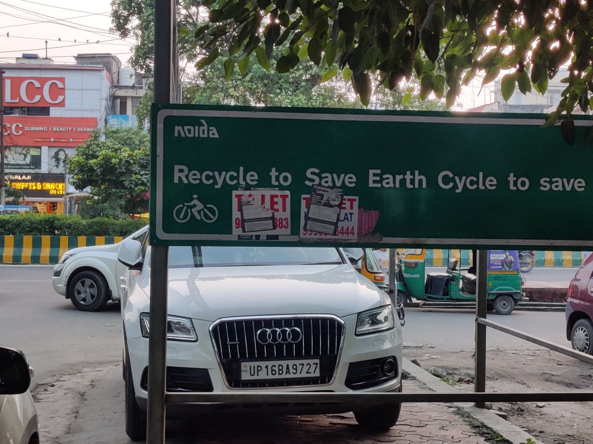 Ratuldev2's tweet photo. @CeoNoida please look at the vehicle parked in e vehicle space..another case of land grabbing https://t.co/yId74Fc5pr