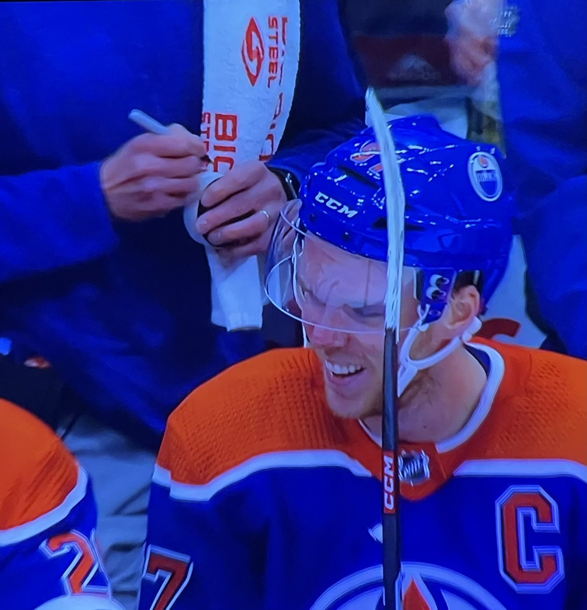 WildEarTugGuy's tweet photo. Classic McJesus highlight. Trainer guy goes backhand/ forehand with the Sharpie on opening night hattie puck. On pace to score 246. @EdmontonOilers @NHL https://t.co/JdszgkuIwA