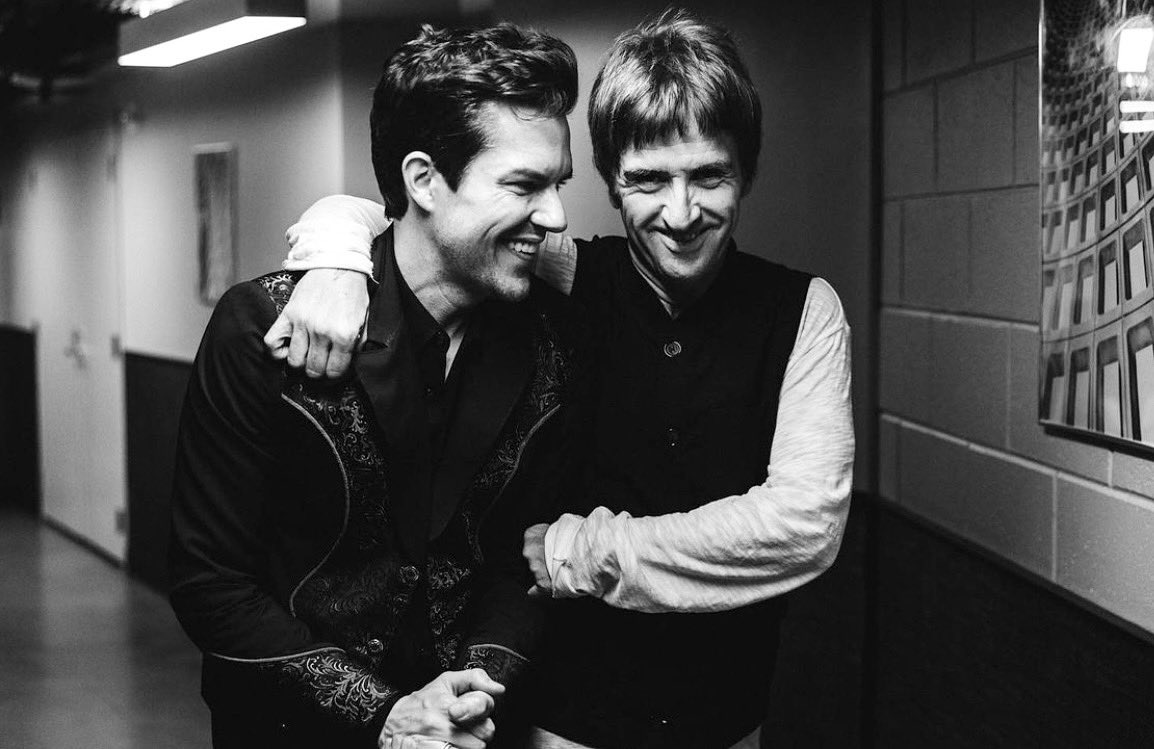 Walking out onstage for the last night of the tour with my friend Brandon. It’s been a blast. The pleasure the privilege is mine. Pic @chrisphelps @brandonflowers <a href="/thekillers/">The Killers</a> #johnnymarrandthekillersontour