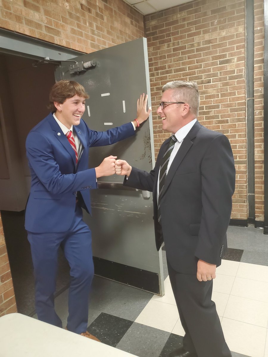 DosesofDula's tweet image. Academy of Finance Director, @CollinsCW and son, Brady, fine-tuning all the details before the AOF Pinning Ceremony....first one since 2019!!!  What a great night!