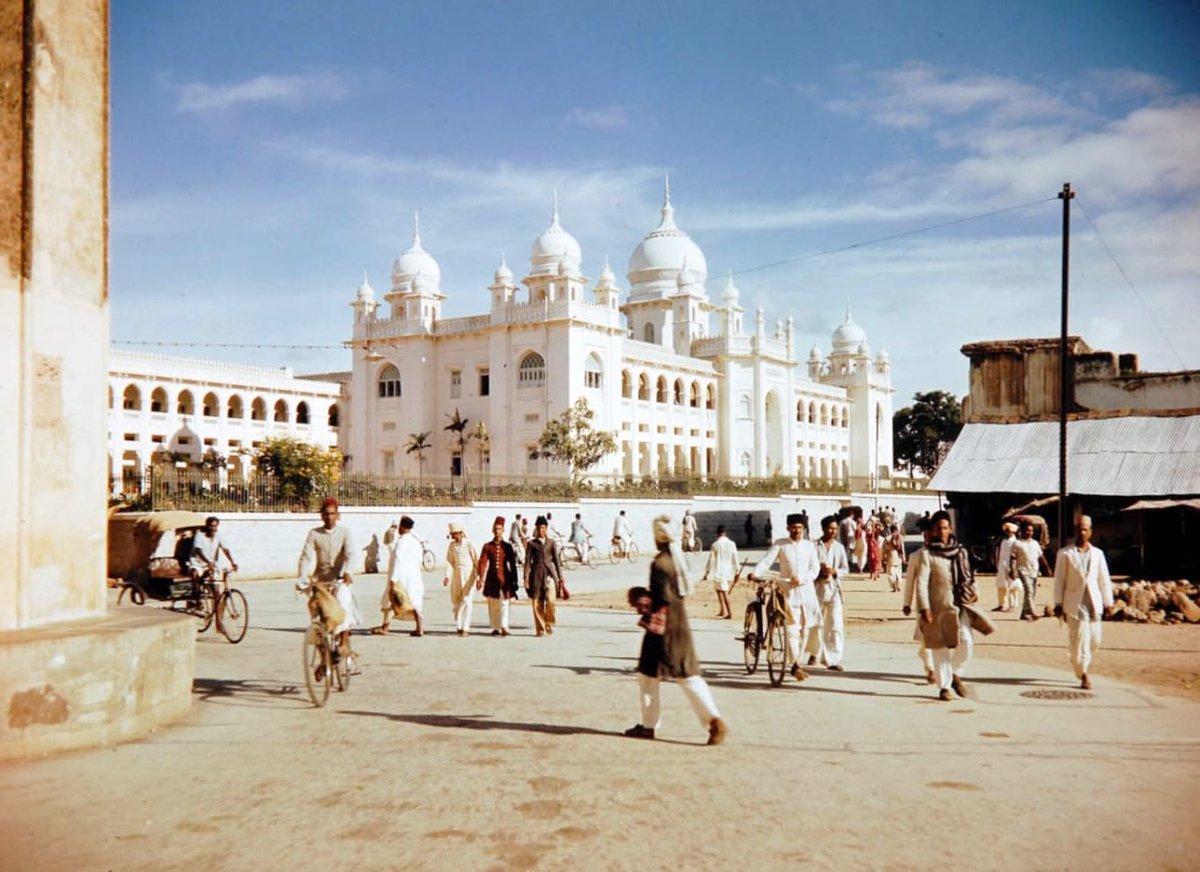 A 1948 pix of Unani hospital near #Charminar. Pedestrians, cyclists and all serene atmosphere. #Hyderabad #History #heritage #people #architecture