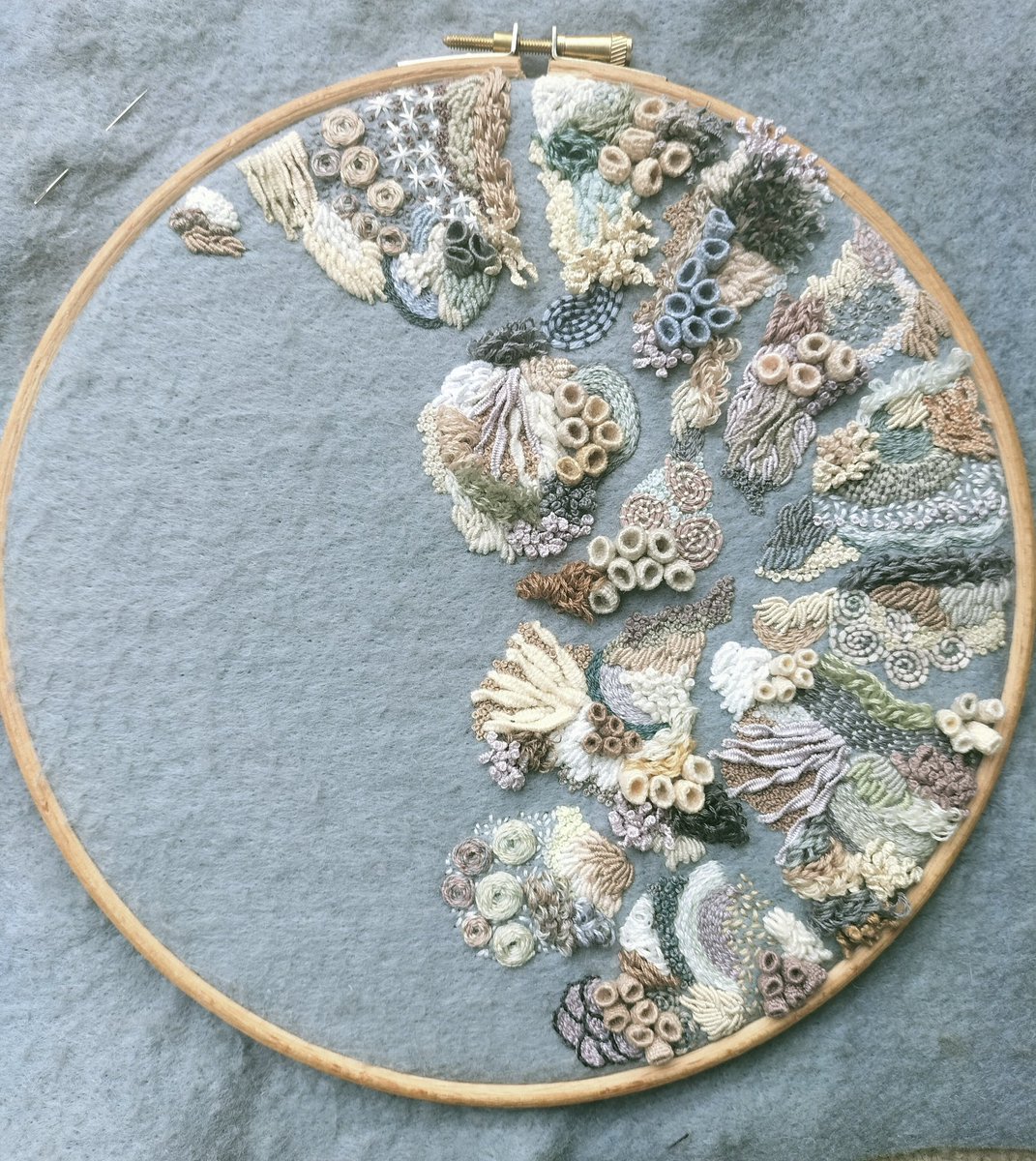 sewnbycollette's tweet photo. This piece has been a stop, start  works. I am determined to finish it so I will continue stitching until it is finished.  My bleached out coral reef embroidery. #ClimateEmergency #ecosystems #embroidery #textileart https://t.co/qUYfQy8dAn