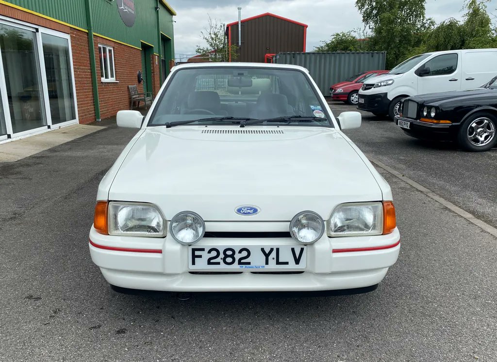 woldsideclassic's tweet photo. Finished in Diamond White with grey cloth sports upholstery this 1988 Ford Escort XR3i has had one owner from new &amp; has covered just 64,000 miles at @woldsideclassic. For more details go to: https://t.co/bp028BocCT #FordEscortXR3i #Ford #Escort #XR3i #classicford #classiccar #80s https://t.co/4uSiXaBeSJ