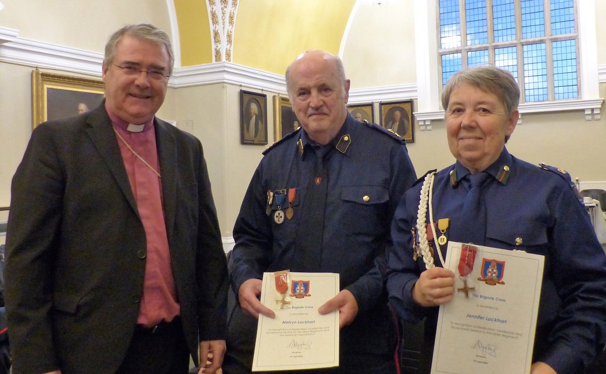 DioceseofConnor's tweet photo. Two members of @CLCGB have been presented with the Brigade Cross - for exceptional service. Melvyn Lockhart (Deputy Governor) and Jennifer Lockhart (Captain of Dobbin CGB) accepted the awards from the CLCGB President, the Archbishop John McDowell. More at https://t.co/PCeFw87R2r https://t.co/7sjmW5RwwR
