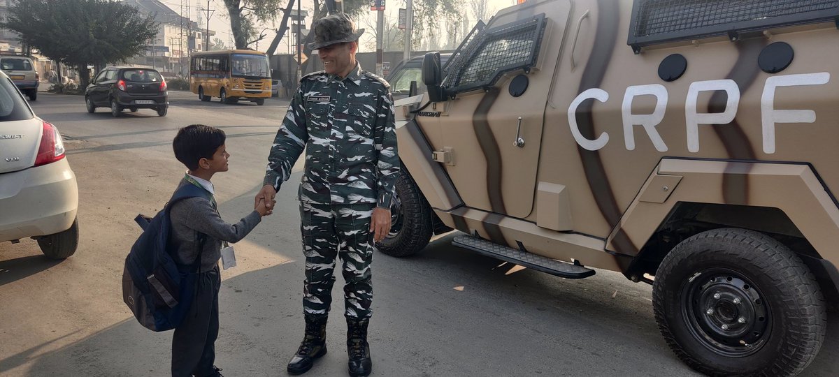 ' Cheerful child greeting officer with Jai Hind Salutation.' A positive sign of change in new generation in Kashmir Valley. Also speaks loud the confidence of people with CRPF. CRPF sada Ajay, Bharat Mata ki Jay. @crpfindia @crpf_srinagar @CRPFmadadgaar