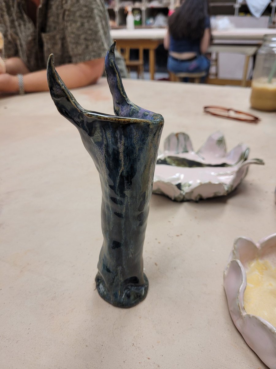update on this cup because she finally got fired. overlaying black and purple glazes resulted in this really sick color variation. better pics to come maybe. #pottery