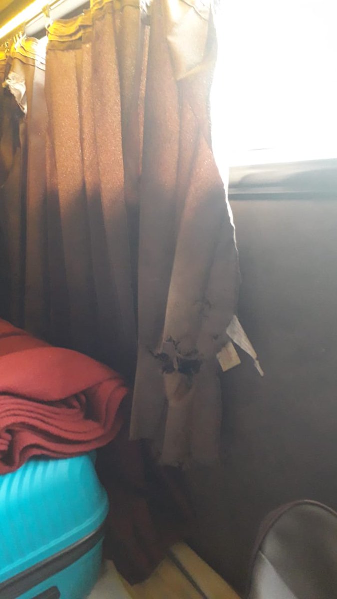 Sumit_210392's tweet photo. Windshield is fully cracked, compartment is smelling badly, curtains and seats are torned, dropped me 5  kms away (best price)  from the dropping point (star square) .For your reference i have attached some pics. https://t.co/BSCPbWHpTs
