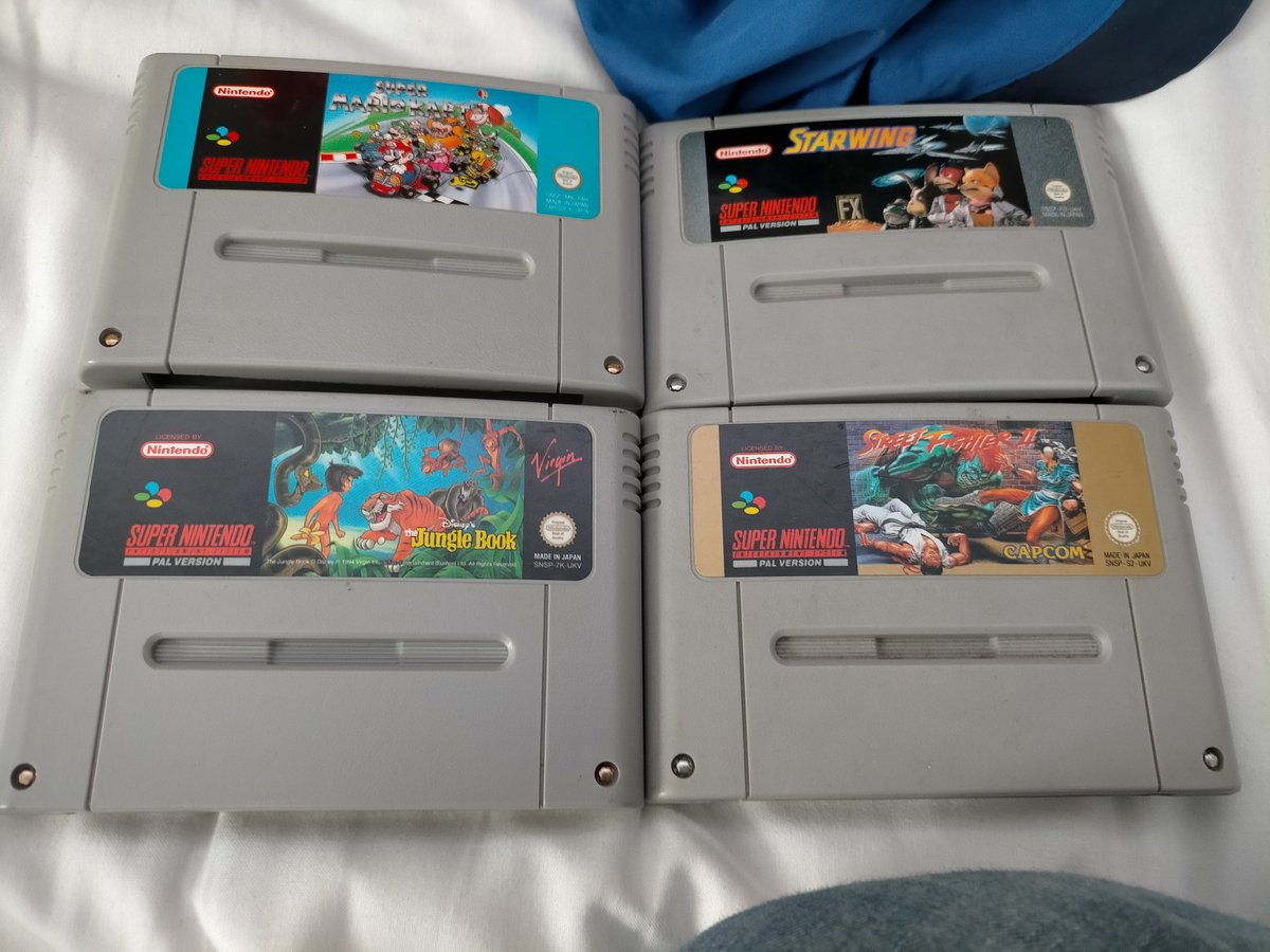 Droulmegus's tweet photo. "What did you bring back from your UK trip?" "Not much, just some game cartridges..." https://t.co/epycP613Y3