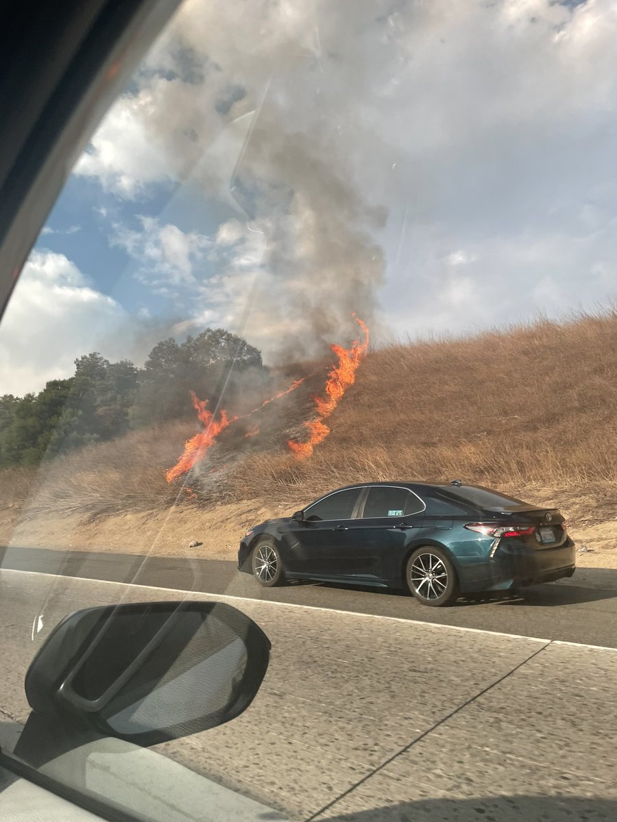 TangoTheFox's tweet photo. hey yall im not dead, also heres a photo of the freeway by my house having the start of a major fire https://t.co/betOjNV8jg
