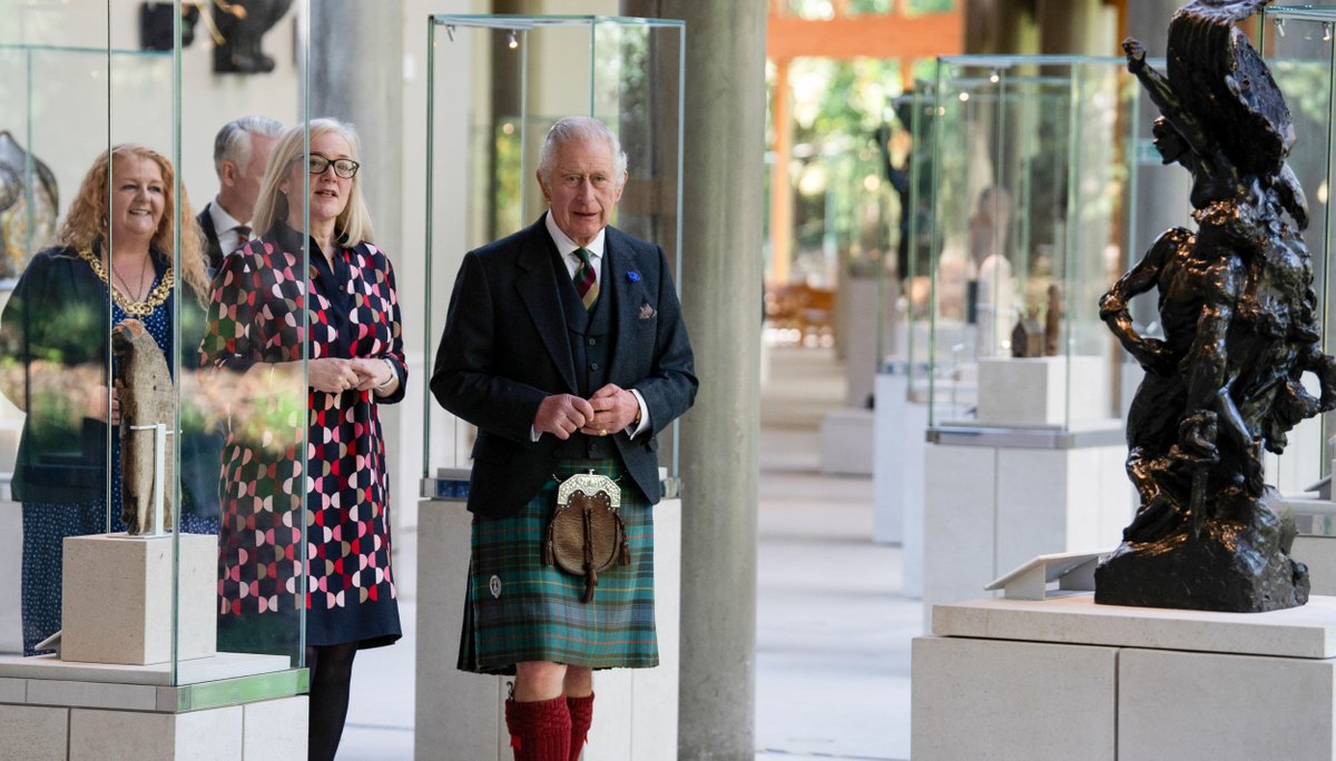 His Majesty the King viewing objects in The Burrell Collection