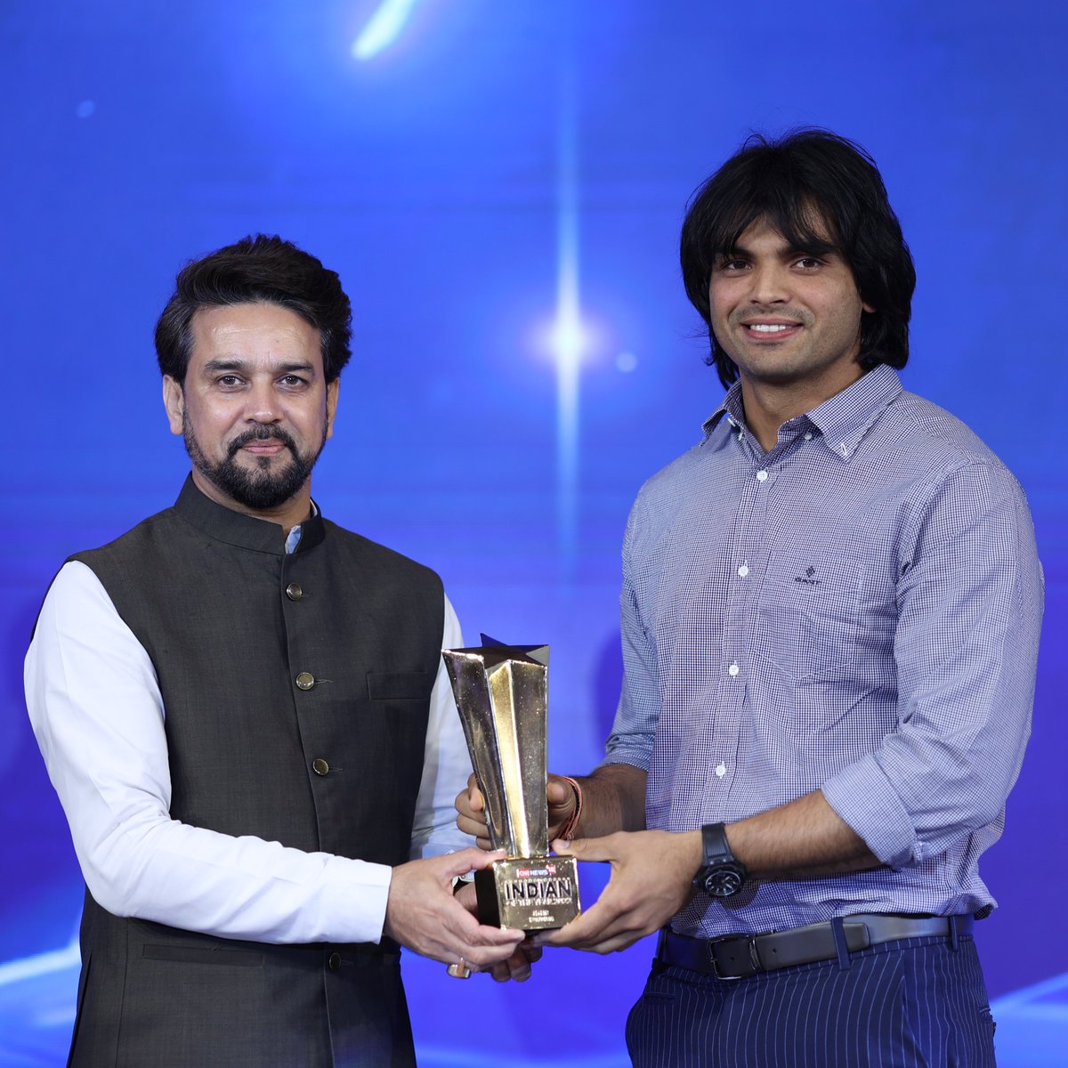 Neeraj_chopra1's tweet photo. Grateful to receive two awards at the @CNNnews18 Indian of the Year 2022, and many thanks to Shri @ianuragthakur ji for presenting me with the trophy. I had a great time on stage with @therealkapildev ji and @RanveerOfficial ji. 

आप सभी के support के लिए बहुत-बहुत धन्यवाद. 🙏🏻🇮🇳 https://t.co/PEuj9XrFTu