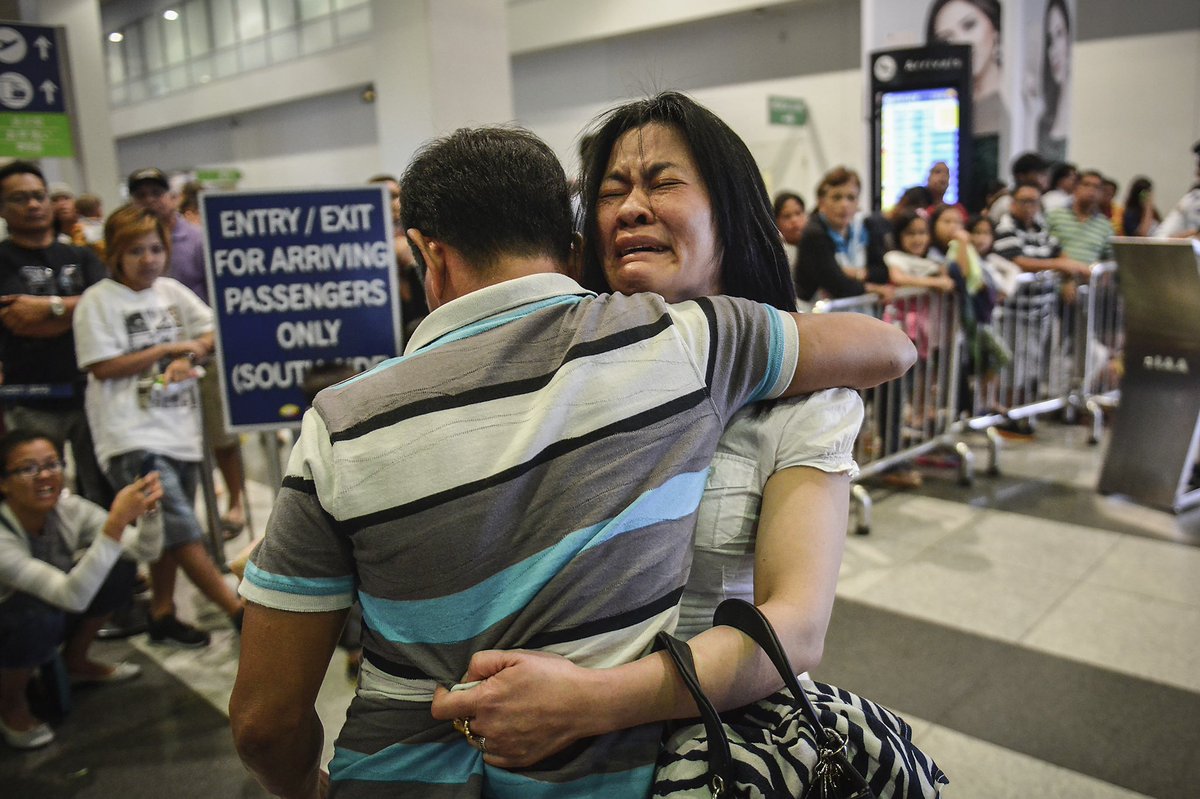 eacayan's tweet photo. April 2, 2017 – Upon arriving from Kuwait where she works as a domestic helper, Luzviminda Siapo broke down in her brother’s arms at the airport. https://t.co/paq7pegtzX