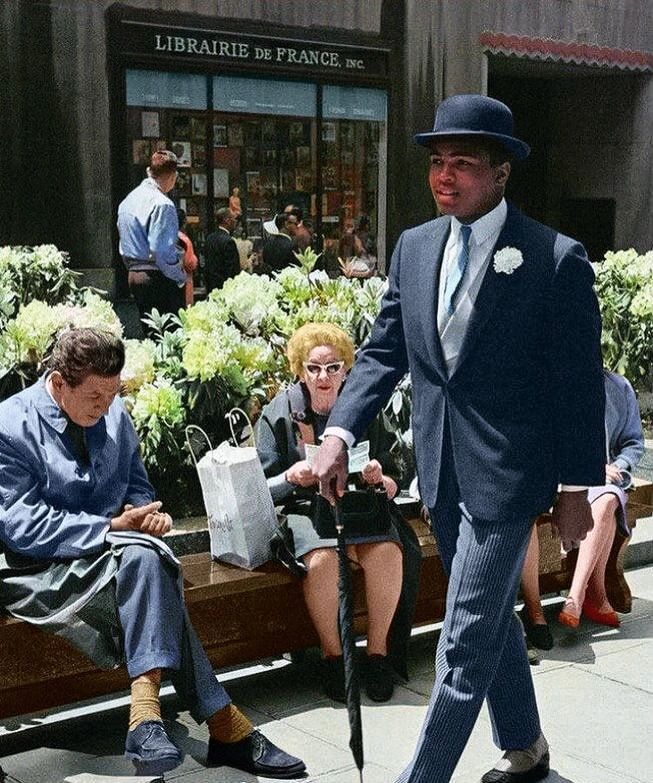 The Greatest. Muhammad Ali strolling in the Channel Gardens in 1963. #ThrowbackThursday (📸 IG: any_colorization_you_like)