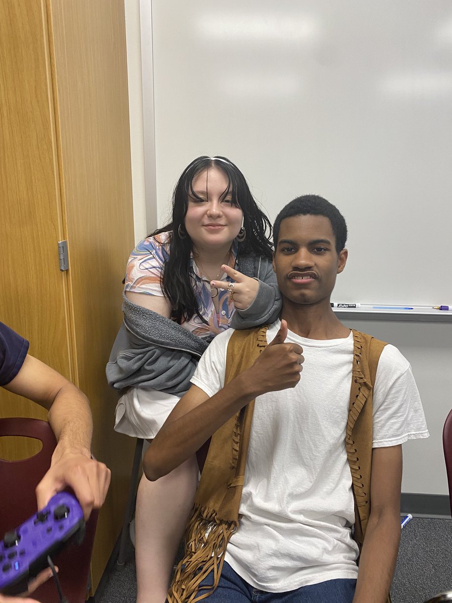 Seniors Gabby and Jordan kick back with 70’s style and play some Atari