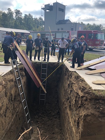 Trench rescue involves shoring up the sides of a trench, and digging a potential trapped worker out of a collapsed ditch.  Our rescue teams practiced these essential skills for 5 days.