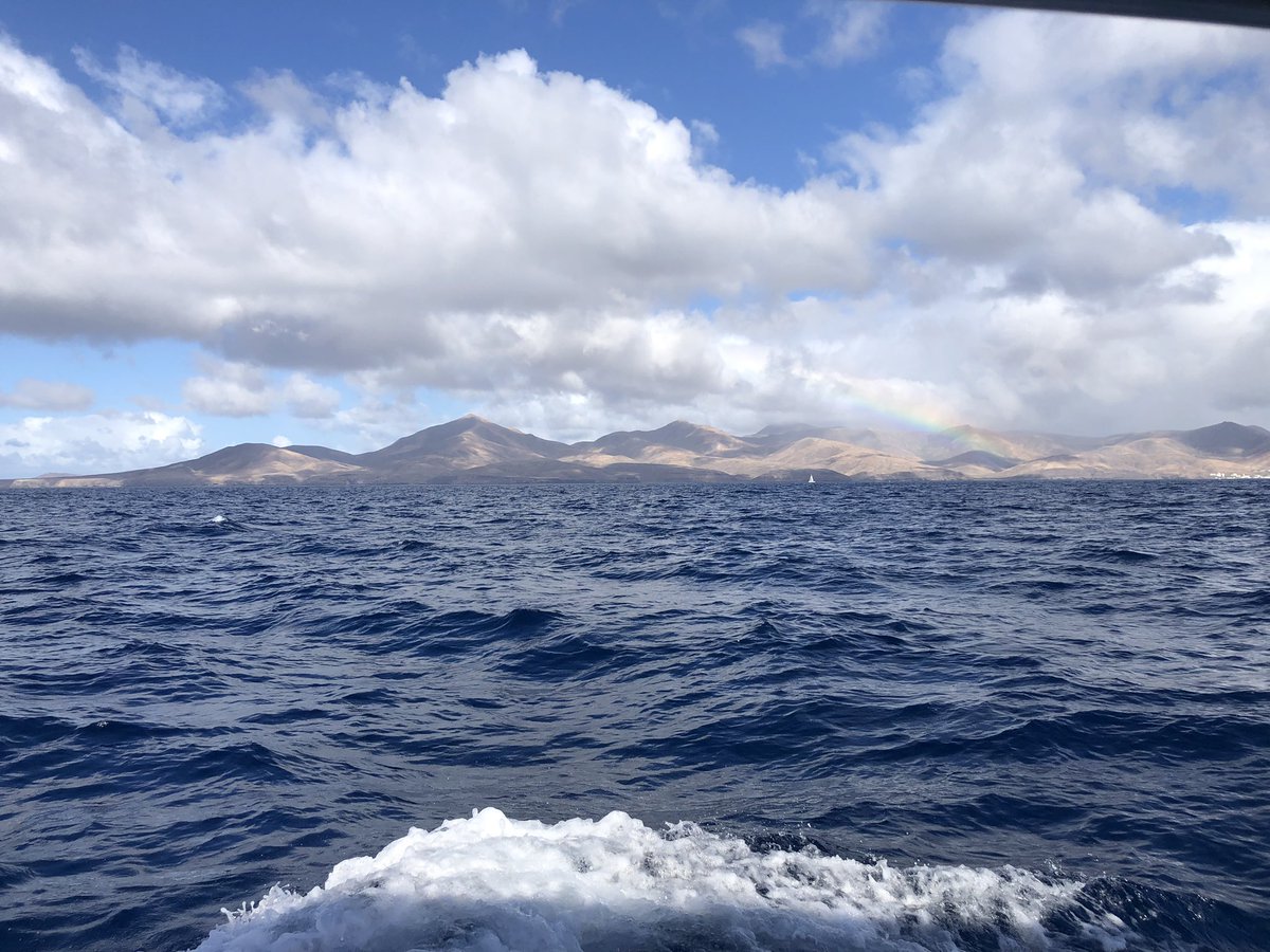 Sandeep_Raina_'s tweet photo. Hills of lava, the ocean blown by Saharan winds, and a bit of a rainbow. https://t.co/1XwUCIYwOp