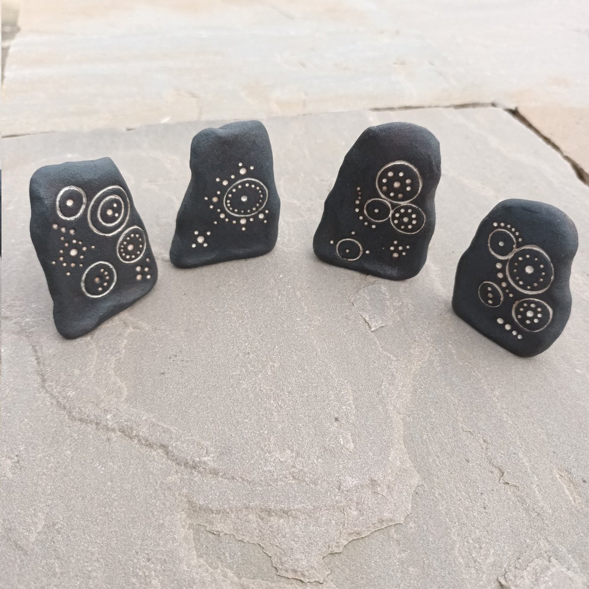 Added today - more of my black standing stones carved with symbols that have been found on ancient standing stones across the UK and further afield.
These symbols are usually weather worn or hidden by lichen so my aim is to show them in all their glory.

rocktroll.co.uk