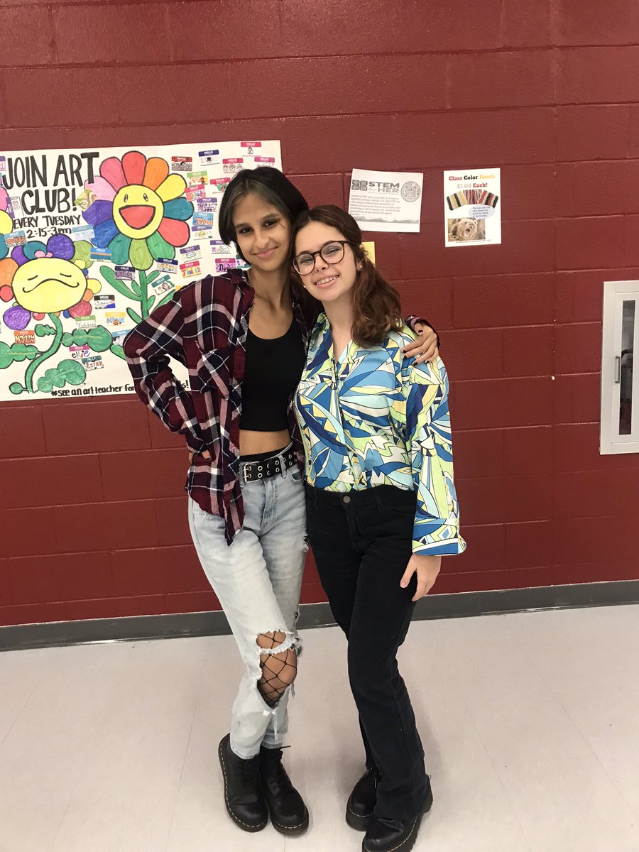 juli and emily showing school spirit