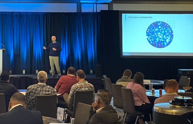 EvolvingSol's tweet photo. Having a great time today at the 2022 Minnesota IT Symposium! Evolving Solutions CTO Michael Downs had the opportunity to share his Modern Operations vision for a future-ready business. #ModernOperations #HybridCloud https://t.co/lO5NhuTkkx