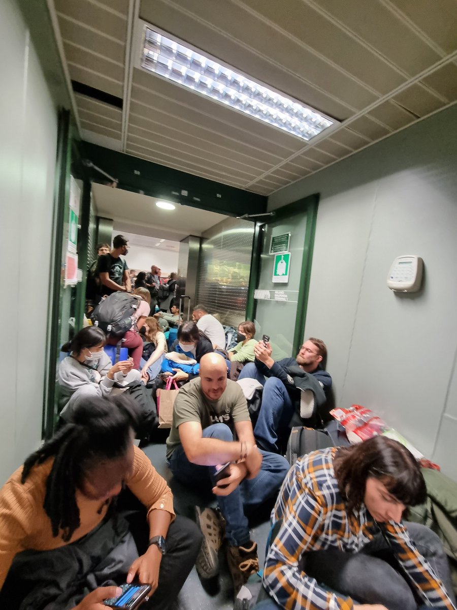 TrillColt's tweet photo. Airport nightmare.
2.5 h queueing for a bag dropoff.
Staff yelling, being rude and not giving information. 
3 h flight delay so far.
Half an hour so far in a crowded, airless hallway.
You've always been sh*t, #wizzair,  but this is the last straw. Welcome on my blacklist. https://t.co/Ln78ytSUHz