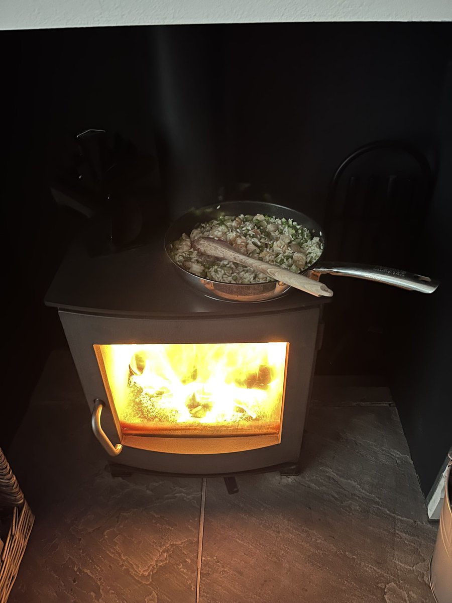 Power cut .. finishing the Risotto off on the log burner !
