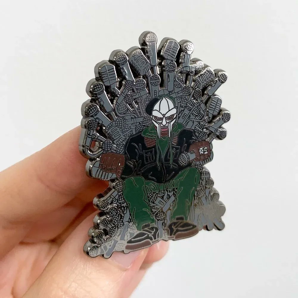 madina_design's tweet photo. GOING…! GAME OF MICROPHONES FT. MF DOOM x LIMITED EDITION @Madina_Design snap back pin (only 100 available). Included are special selection of Postcards & Stickers available here... https://t.co/SkozM5HMxQ << #MFDOOM #MFDOOMRIP #MFDOOMFOREVER #HIPHOP https://t.co/KX1xrpOLSH