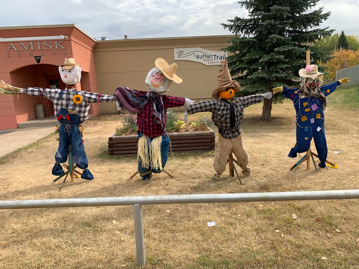 AmiskSchool's tweet photo. Our scarecrows are representing Amisk School in the scarecrow contest for Amisk Fall Festival! Each class made their own scarecrow with materials the students brought. Way to go, Amisk School! Thanks to Mr. Flaade for building &amp; setting up the stands! #amiskschool #btpstogether https://t.co/kGKfm4mYty