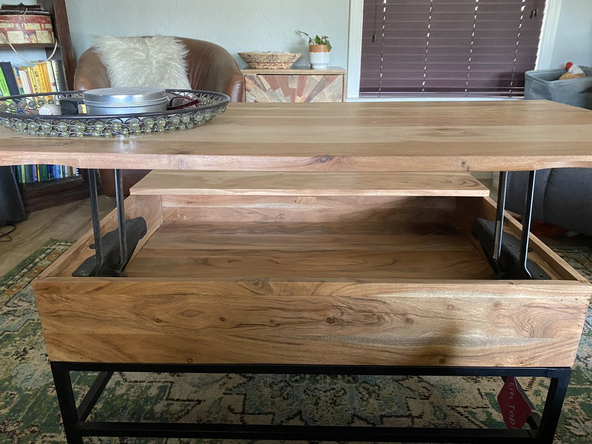 ScotWitch's tweet photo. My new small-sized acacia wood lift-top coffee table w/storage! Now I can work on a surface &amp; not have to balance my computer, papers, etc.! I’ve been searching for over a year, but the one I wanted (exact style but  mango wood) cost too much. It’s the little things. . . https://t.co/jSoYkW2IiN
