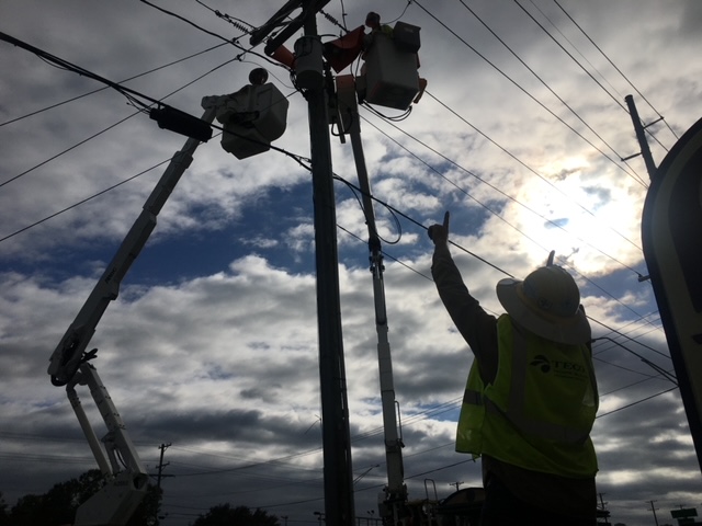 TampaElectric's tweet photo. The sun might be going down, but we won’t stop until we get the power in our entire community back up! Our crews are working around the clock to make it happen. #HurricaneIan #RestoringPower #TampaElectric https://t.co/SUXSITuLcE
