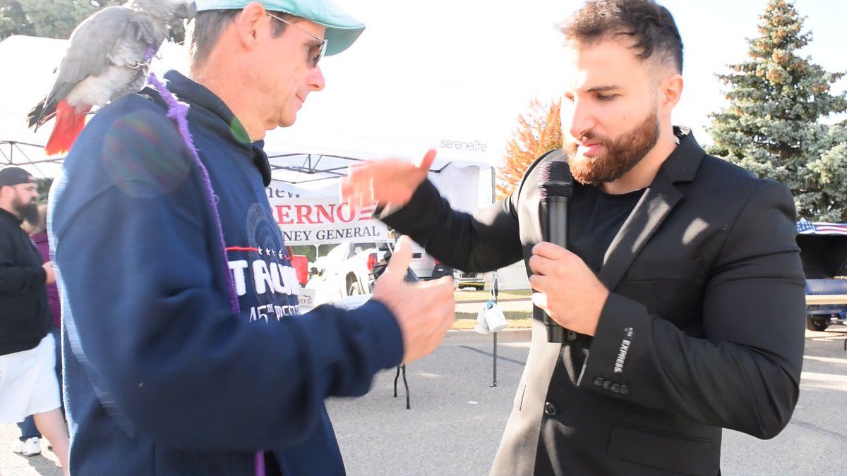 InfraHenry's tweet photo. Haz Al Din, founder of #MAGACommunism interviewing MAGA supporters at today's Trump Rally. https://t.co/I9OHm93uP2