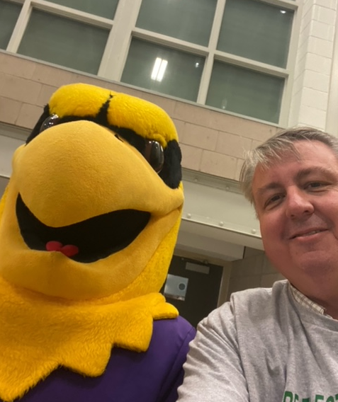 MarkSchadenberg's tweet photo. Attended @wluathletics Golden Hawks vs @gryphonsguelph in OUA women's hockey at #communitycomplex. Great night with proceeds to @unitedwayoxford and @WdstkWildcats, and I took a picture with a big bird. #ReElectMark https://t.co/sAkOT4kvxC