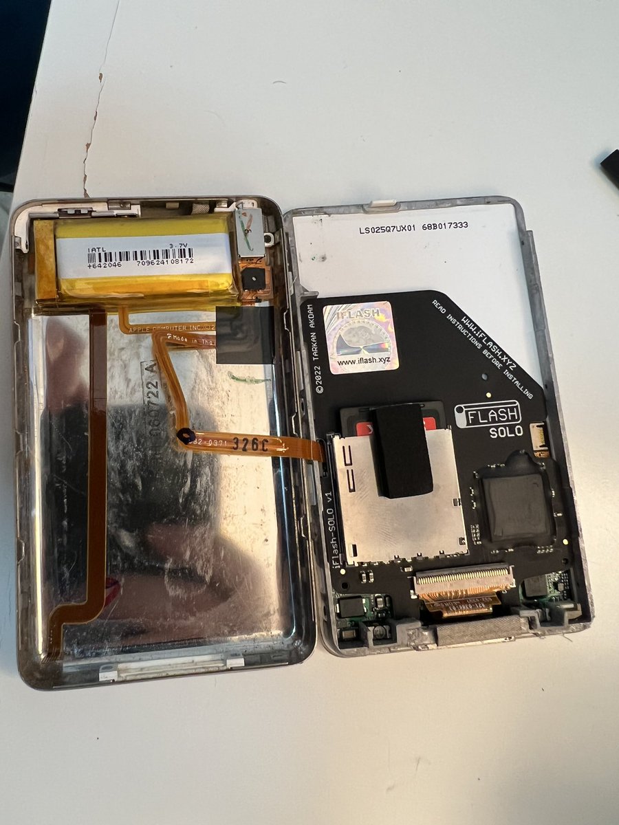 jwschindler's tweet photo. Retrieved 2005-vintage iPod from the depths of the junk drawer and swapped out the 30GB HDD for a 256GB SD card, with a little help from https://t.co/o3GJzyDRTH. Why not? https://t.co/6fsbhPBTVi