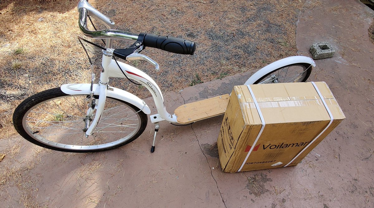 RescueEwe's tweet photo. For my next trick: roadside freebie scooter + eBike wheel kit + trimmer/mower battery! 🪄🐇 #eMicroMobility 🔋🛴 https://t.co/ZiCbPqbjpa