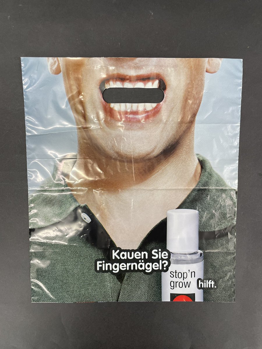 274/365: This cleverly designed plastic bag is a German advertisement for a product that discourages nail biting.