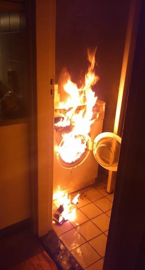 What is this cringey orange stuff coming out of my laundry machine? Smells really hot