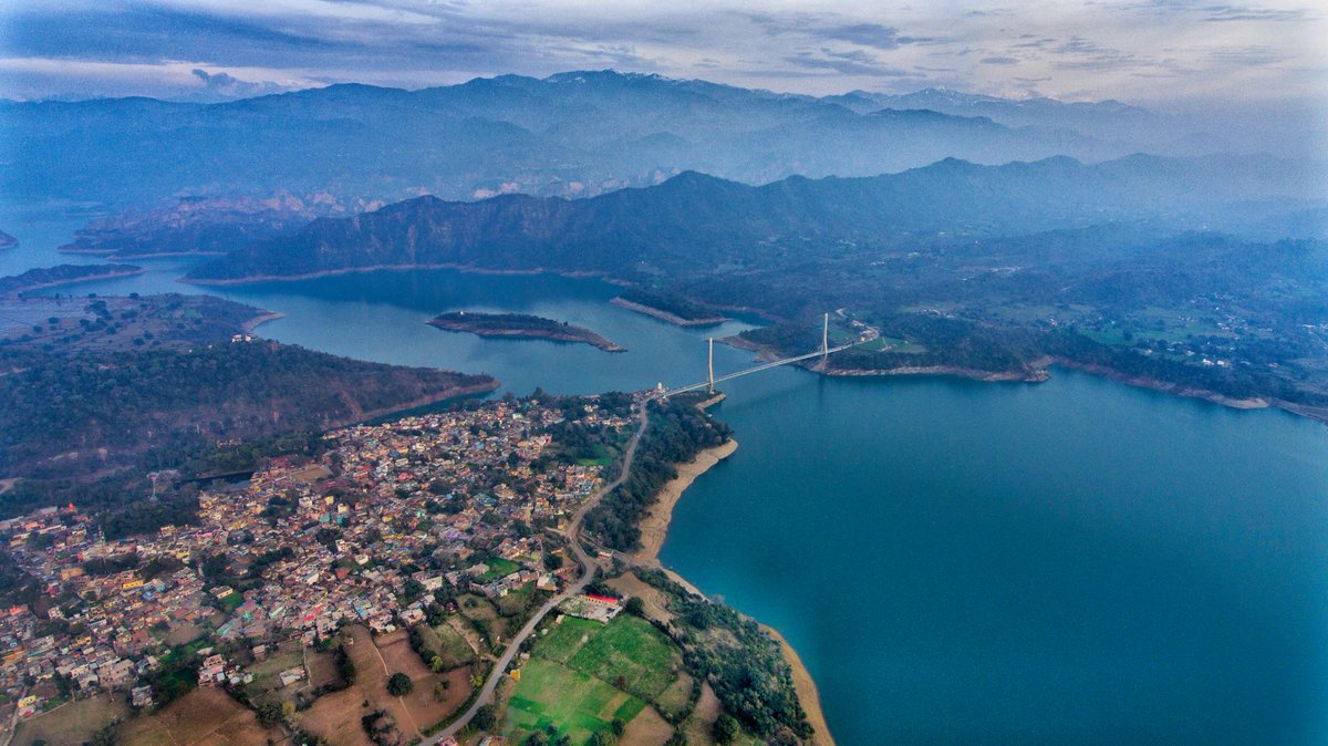 Bird view of Basohli town, Atal setu, Ranjit Sagar lake and beautiful mountains in the back.

#AmazingJammu
#Jammu
#IncredibleIndia