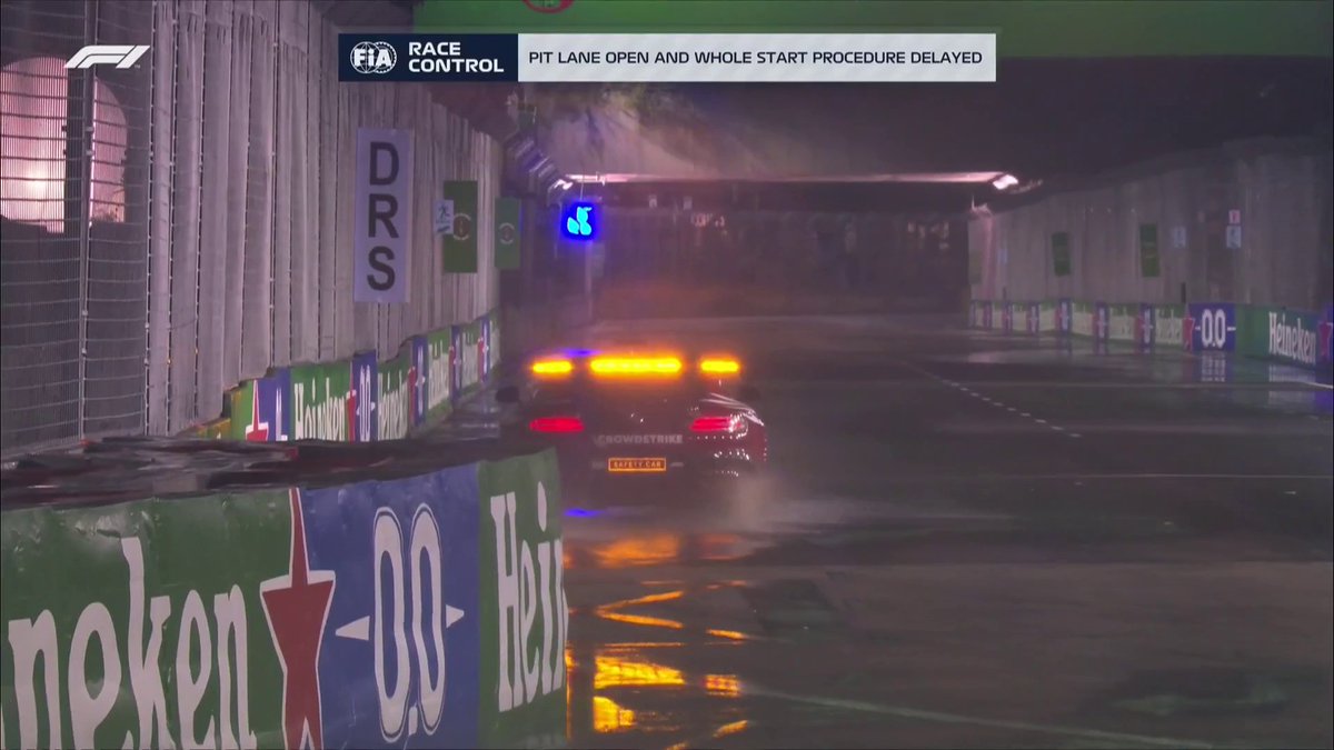 The pit lane is open, with the start procedure delayed here in Singapore!