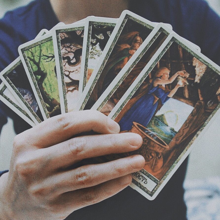 Druid Craft Tarot. {Hands, cards, druids.}