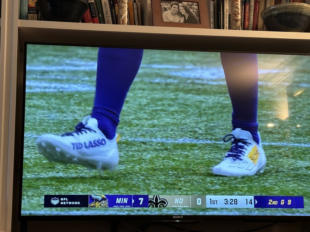 alanschwarz's tweet photo. Hey, interesting ad for #TedLasso on @athielen19 uniform. When did straight-out ads become allowed on #nfl uniforms/shoes? (Non-Nike, charity, etc.) I simply don’t know. @el_belson https://t.co/n3N7mJ6qKg