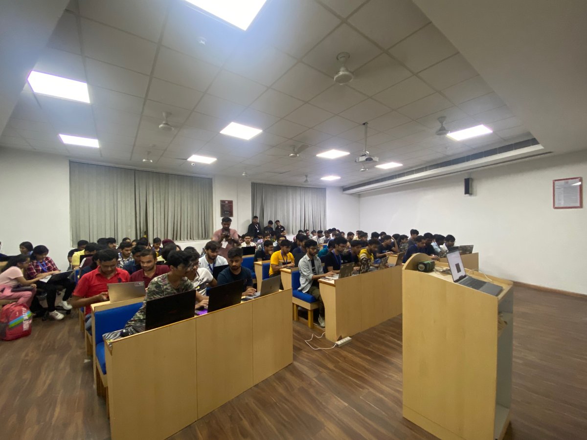 MLHacks's tweet photo. Hackers at #HackVSIT are ready to take on the @snyksec cybersecurity challenge! Will they find the flag? https://t.co/OT2RBx43Hz