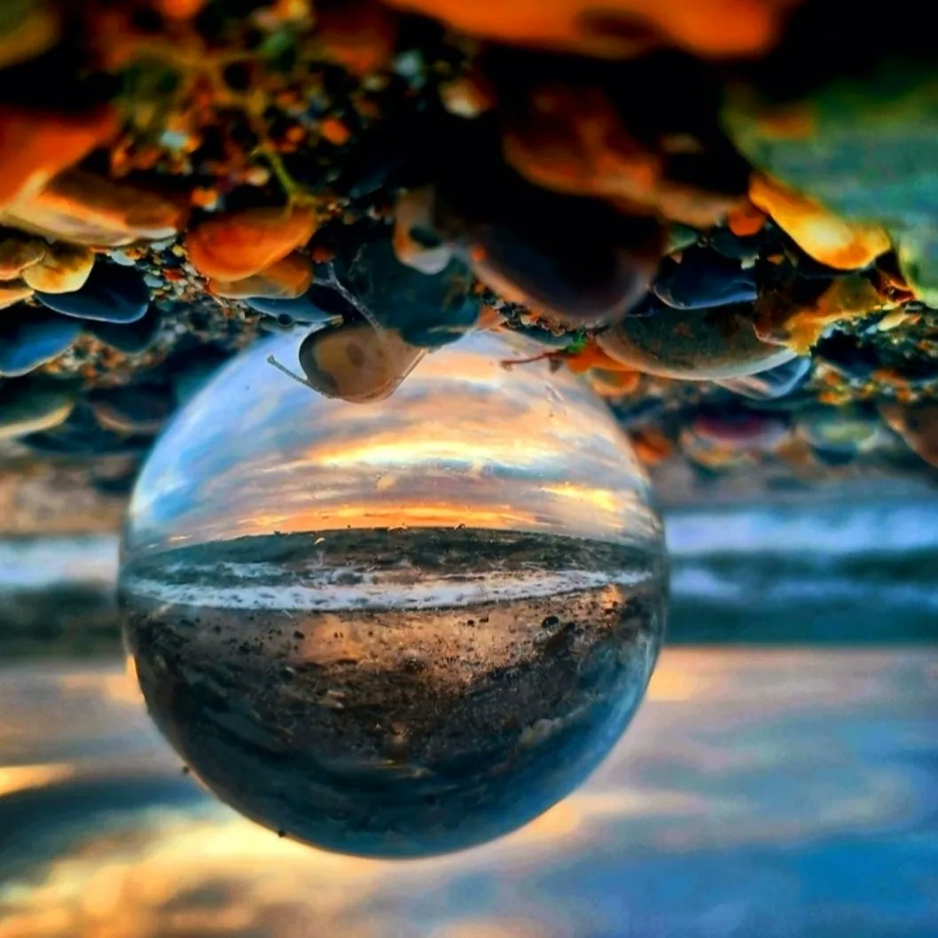 Sunny south east during the summer was well worth getting around wexford - kilmore📍 🌅📸

I walk, I look, I see, I stop, I photograph 📸 
#photography #wexford #kilmore 
#pebbles #beach #photographer
#lensball #photo #sunset #vibes  #sunsetphotography #oceanlife #summershot